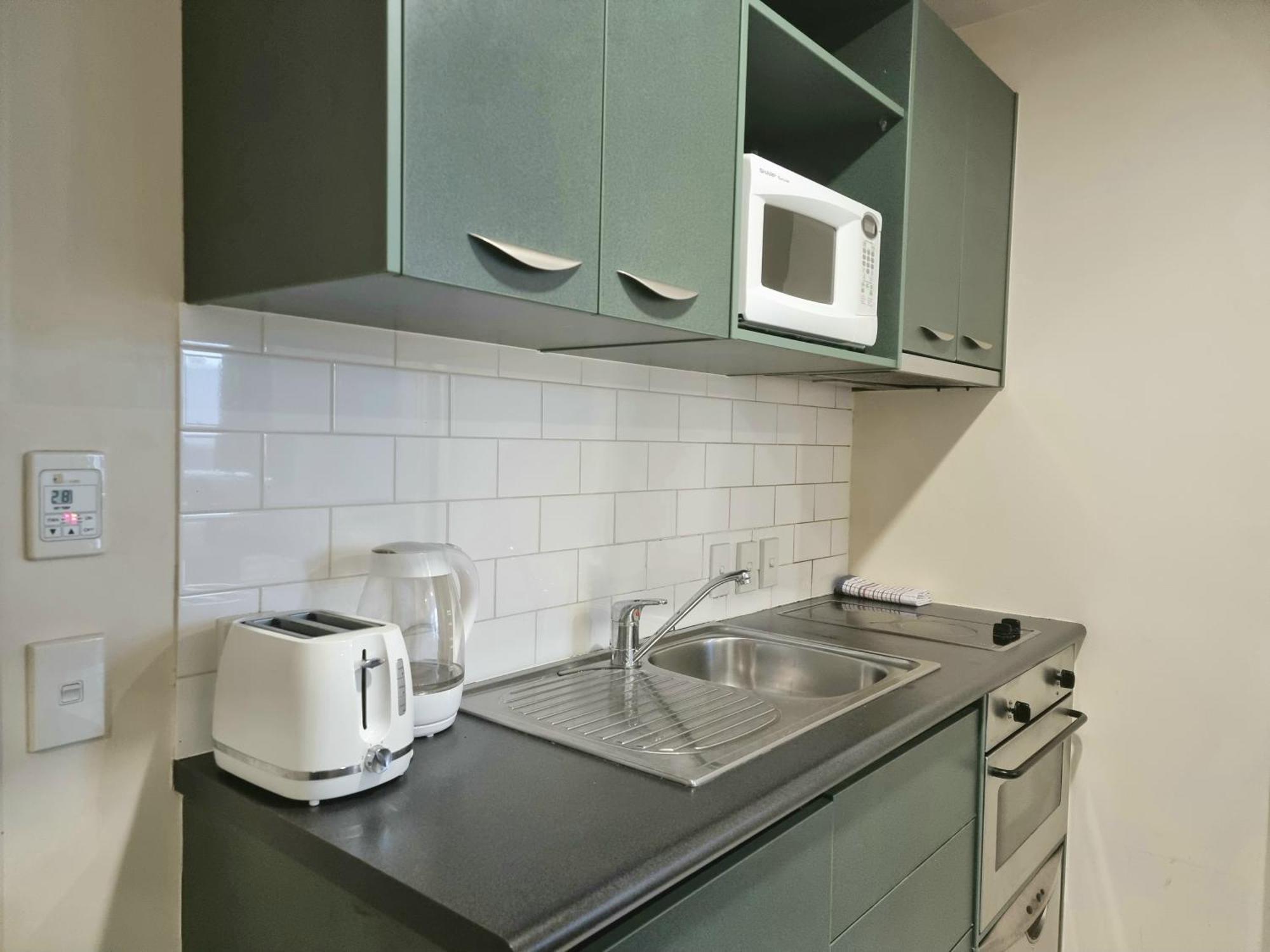 Urban Deco Apartment On Queen Street Auckland Szoba fotó
